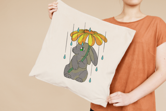 Rabbit Holding Flower Embroidery Design